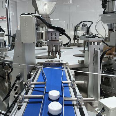Ein guter Preis. Feuchtigkeitsbeständige Kappe Automatische Kieselgel-Trockenmittel-Kappenmontagemaschine Anpassbar, gesteuert durch SPS und bedient über Bildschirm Online