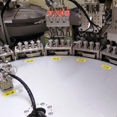 Automatic IV Bag Spike Ports and Injection Ports Assembly Machine with PLC Control System and Stainless Steel Construction for 8000-15000pcs/hr Production